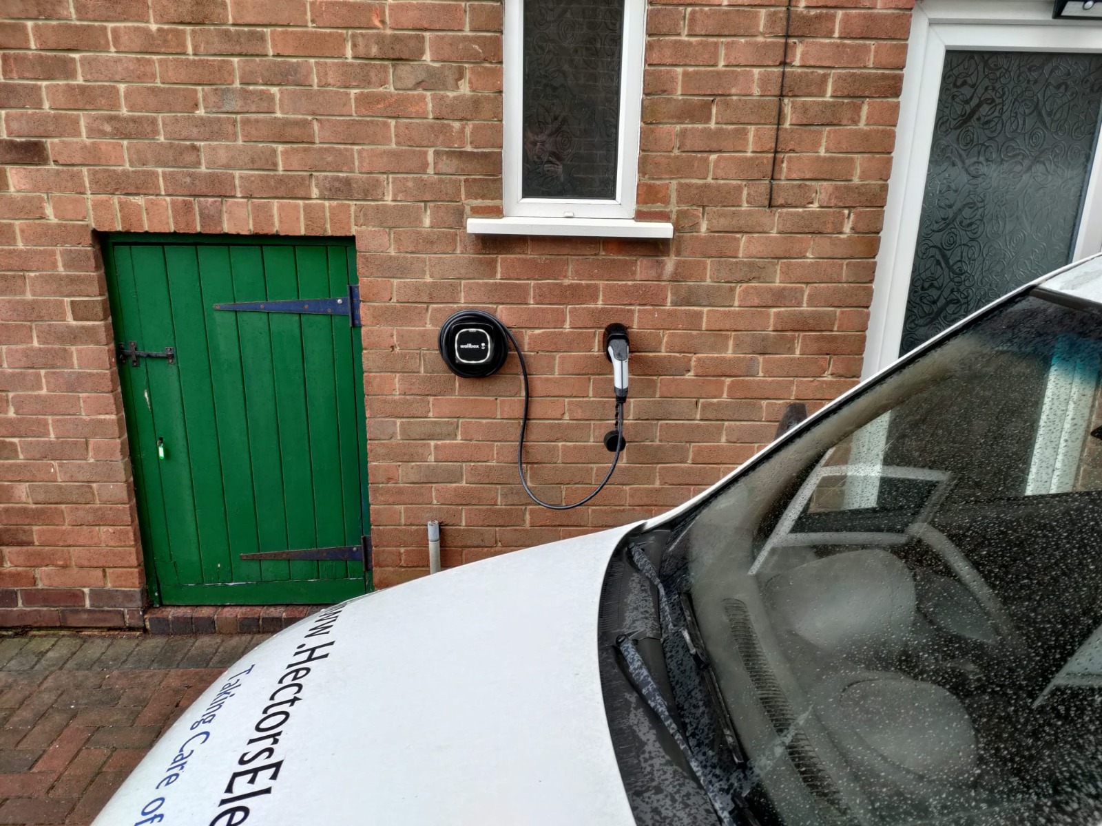 An image of the Wallbox Pulsar Plus 7kW EV situated on the wall